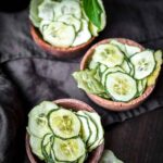 Dehydrating Cucumbers served inside a bowls.