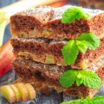 Rhubarb dessert with fresh mint leaves.