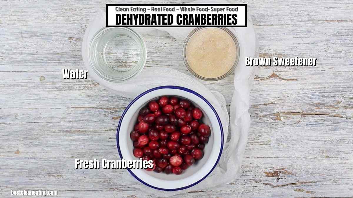 Dehydrated cranberries in a bowl on a wooden table.