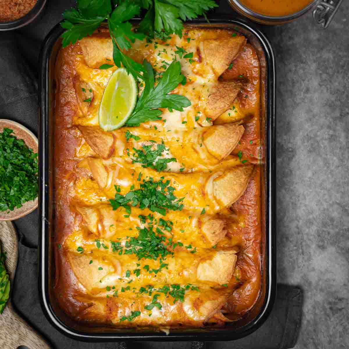 Mexican enchiladas in a baking dish.