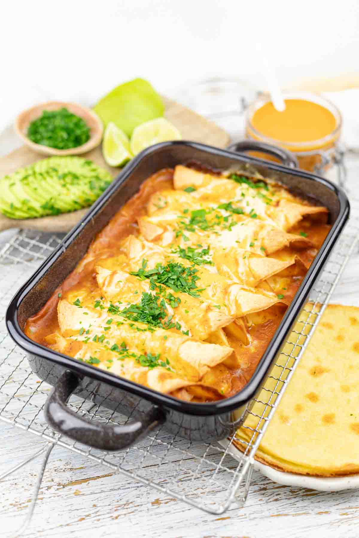 Mexican enchiladas in a baking dish.