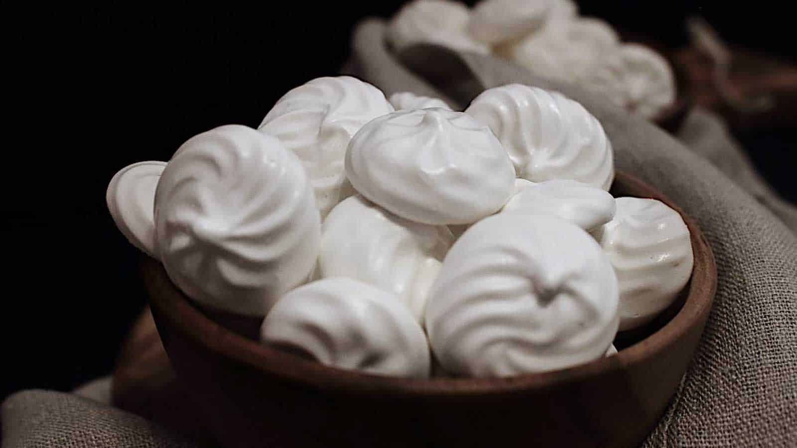 Sugar Free Keto Meringue Cookies in a dark bowl.