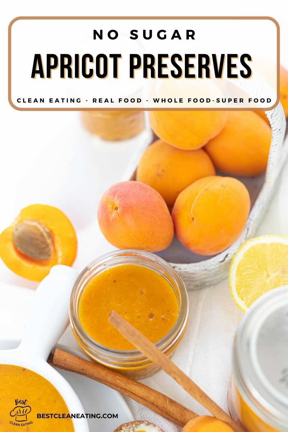 Jar of apricot preserves with a label reading "No Sugar Apricot Preserves." Surrounded by fresh apricots, a slice of lemon, and a spoon in the jar. The scene emphasizes clean eating and real food.