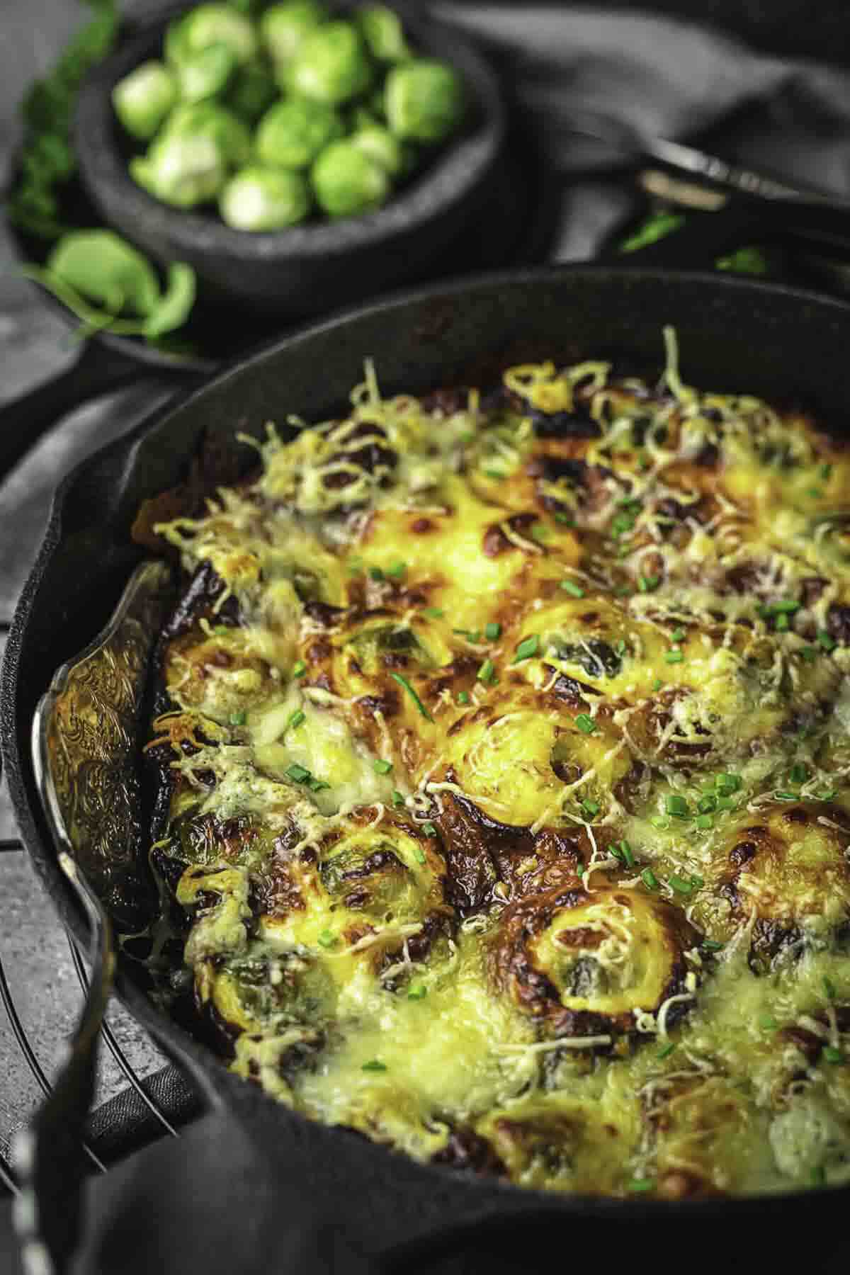 A casserole with brussel sprouts and cheese.