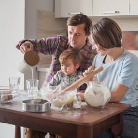 Parents preparing to bake.