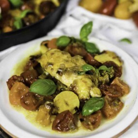 A close-up of caprese chicken.