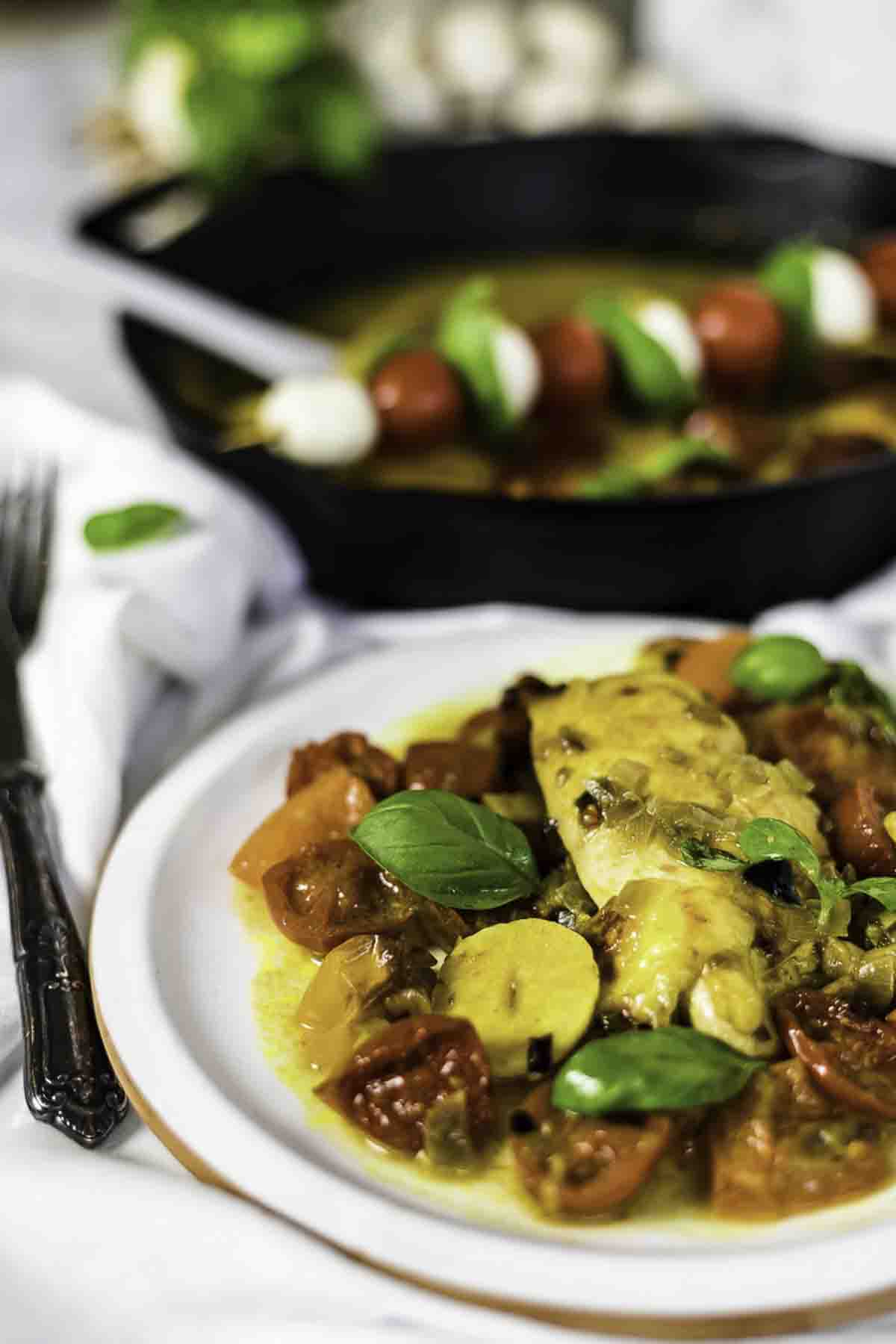 Caprese chicken with herbs.