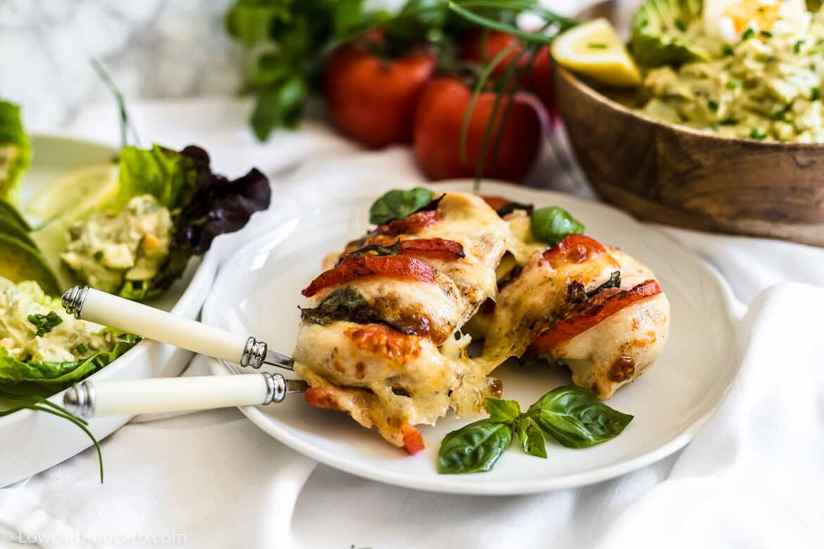 Grilled chicken with tomatoes and basil.