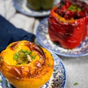 Stuffed yellow and red bell peppers.