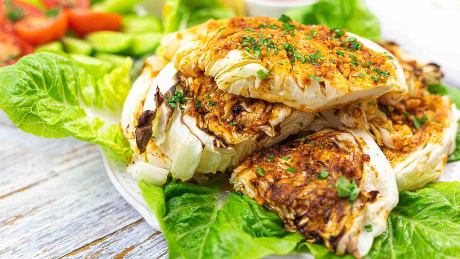 Grilled cabbage wedges seasoned with herbs and spices.