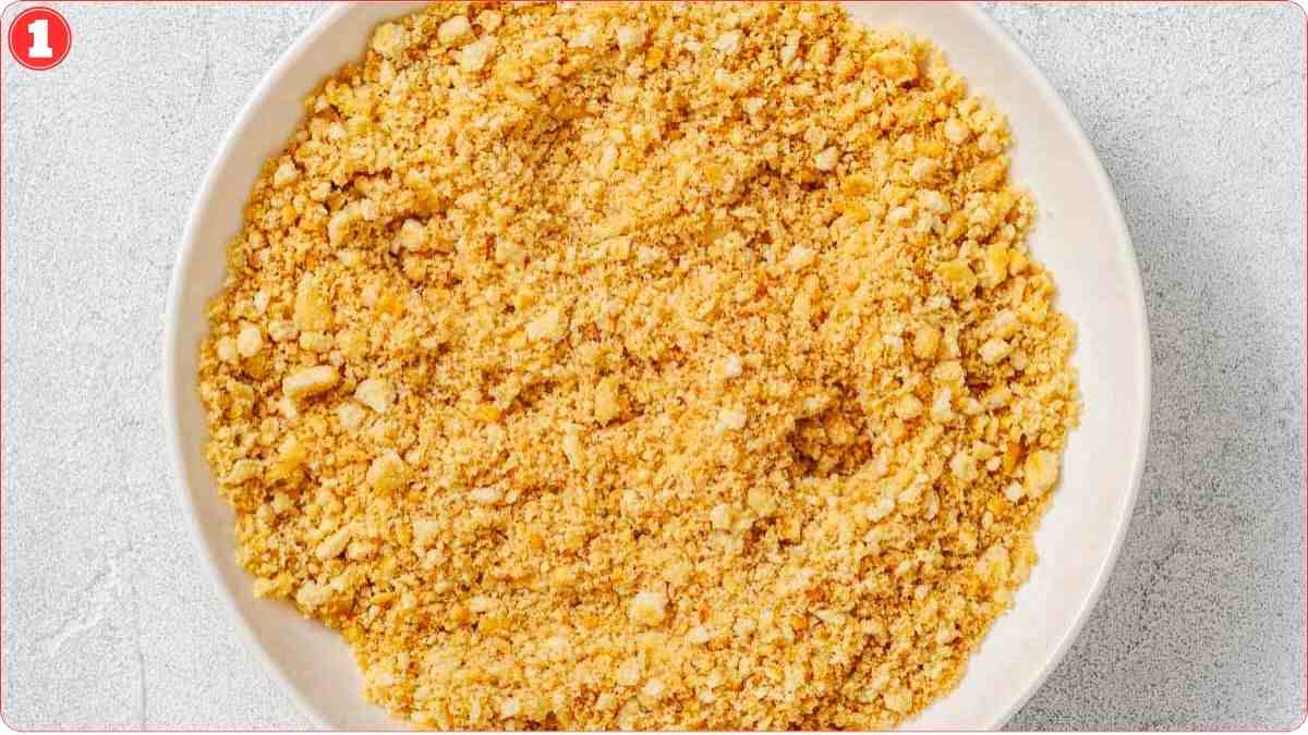 Crushed cracker topping mixture in white bowl.