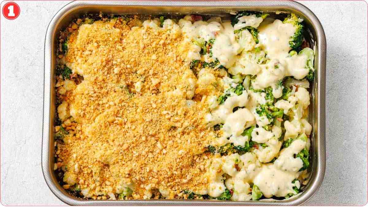 Broccoli casserole topped with crumbs before baking.