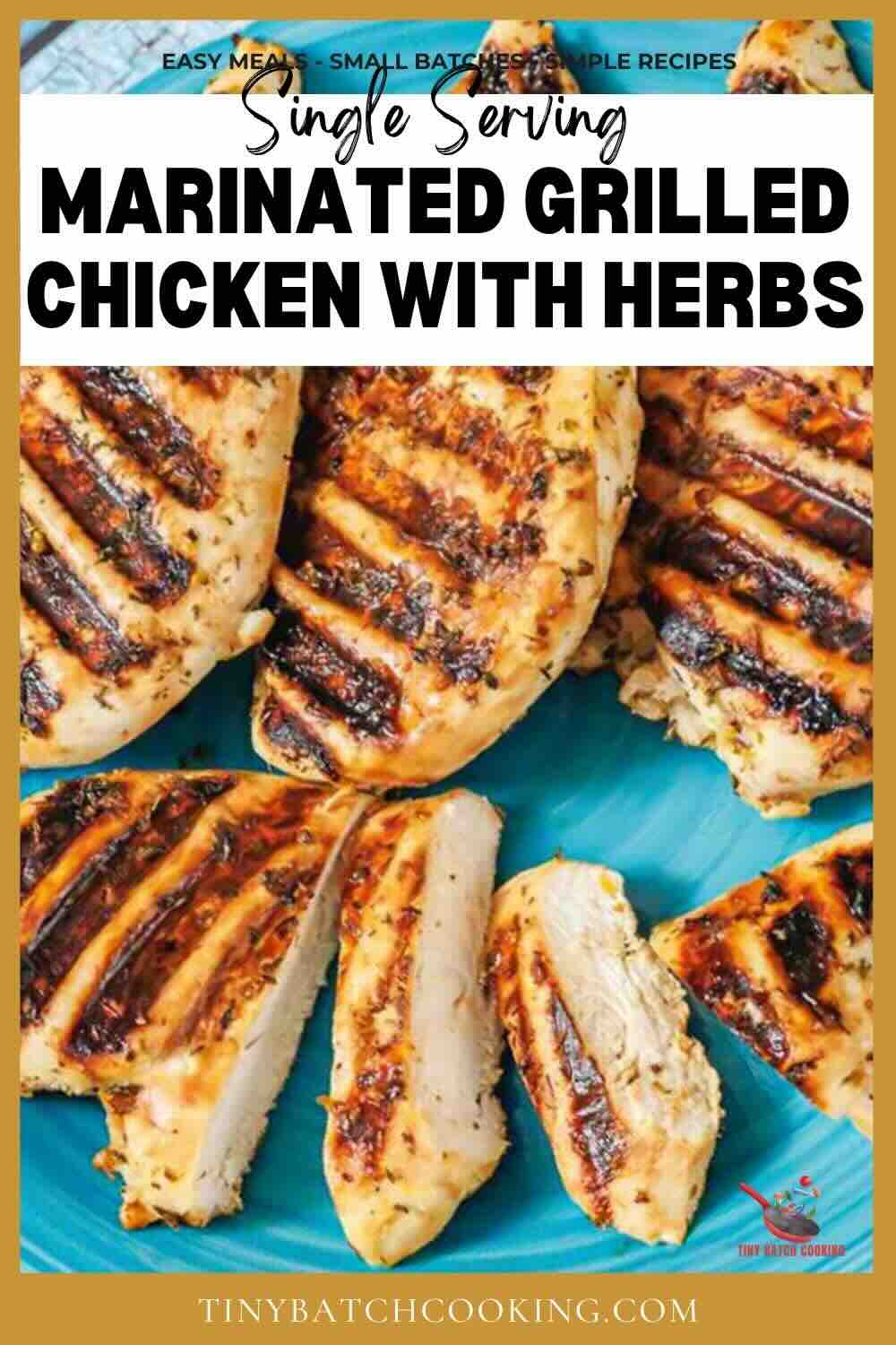 Grilled chicken breasts with visible grill marks, sliced and served on a blue plate.