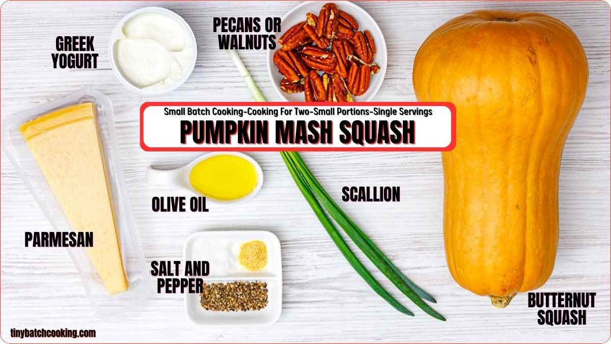 Ingredients for pumpkin mash squash, including Greek yogurt, pecans or walnuts, Parmesan, olive oil, salt and pepper, scallion, and butternut squash, arranged on a white surface.